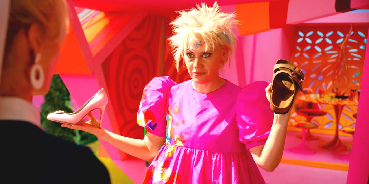 Kate McKinnon portrays the role of Weird Barbie holding a high heel and a Birkenstock in the live-action movie.