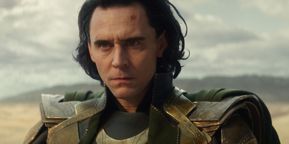 Loki wakes up in the desert looking angry in Loki
