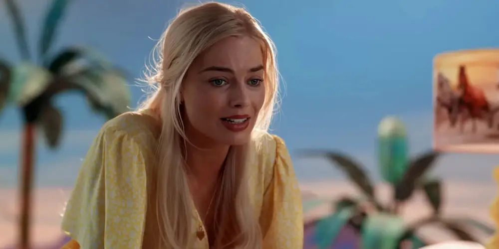 Margot Robbie como Barbie em Barbie parece triste.