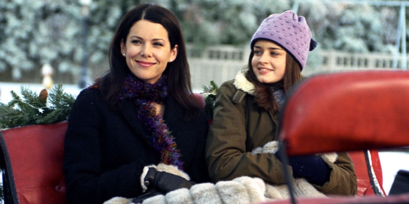Lorelai e Rory sentadas em um trenó em "The Bracebridge Dinner" em Gilmore Girls.