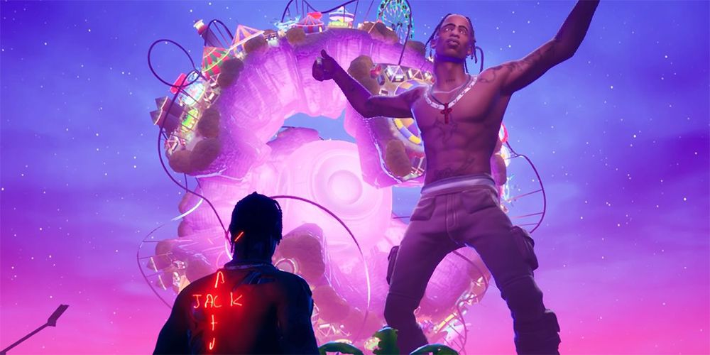 Travis Scott's animated avatar performing on a grand stage within the Fortnite game environment, surrounded by vibrant visual effects