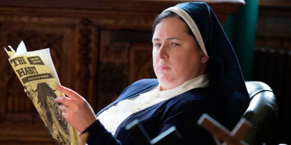 Siobhan McSweeney as Sister Michael reading a magazine in Derry Girls