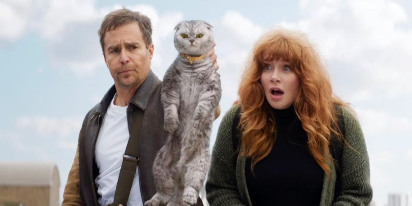 Sam Rockwell holds cat over ledge next to a stunned Bryce Dallas Howard in Argylle