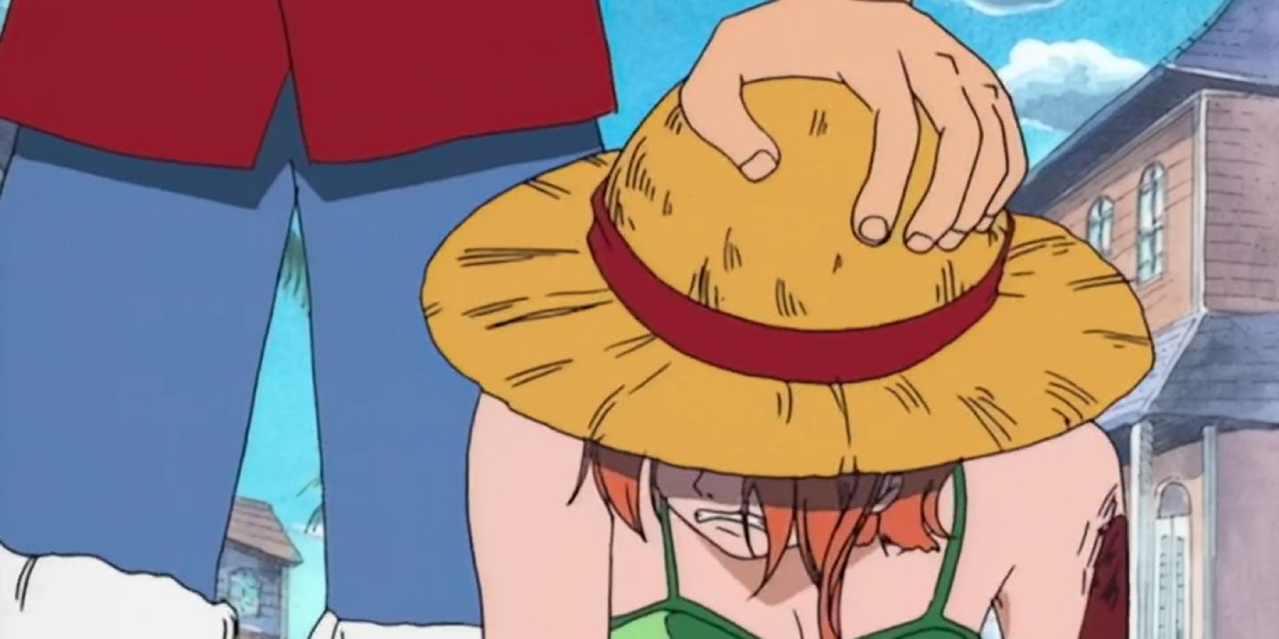 Luffy gives Nami his hat before he heads off to fight Arlong in One Piece.
