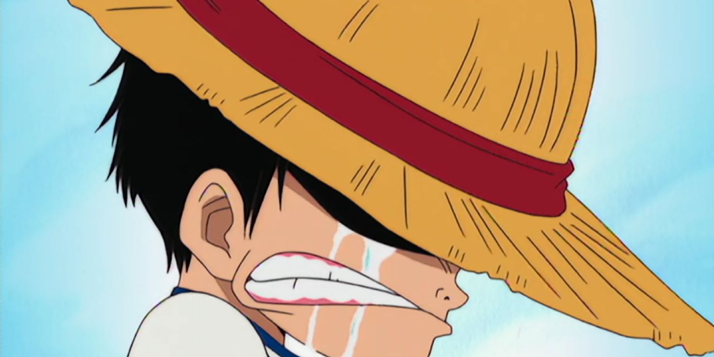 Shanks gives Luffy his straw hat.