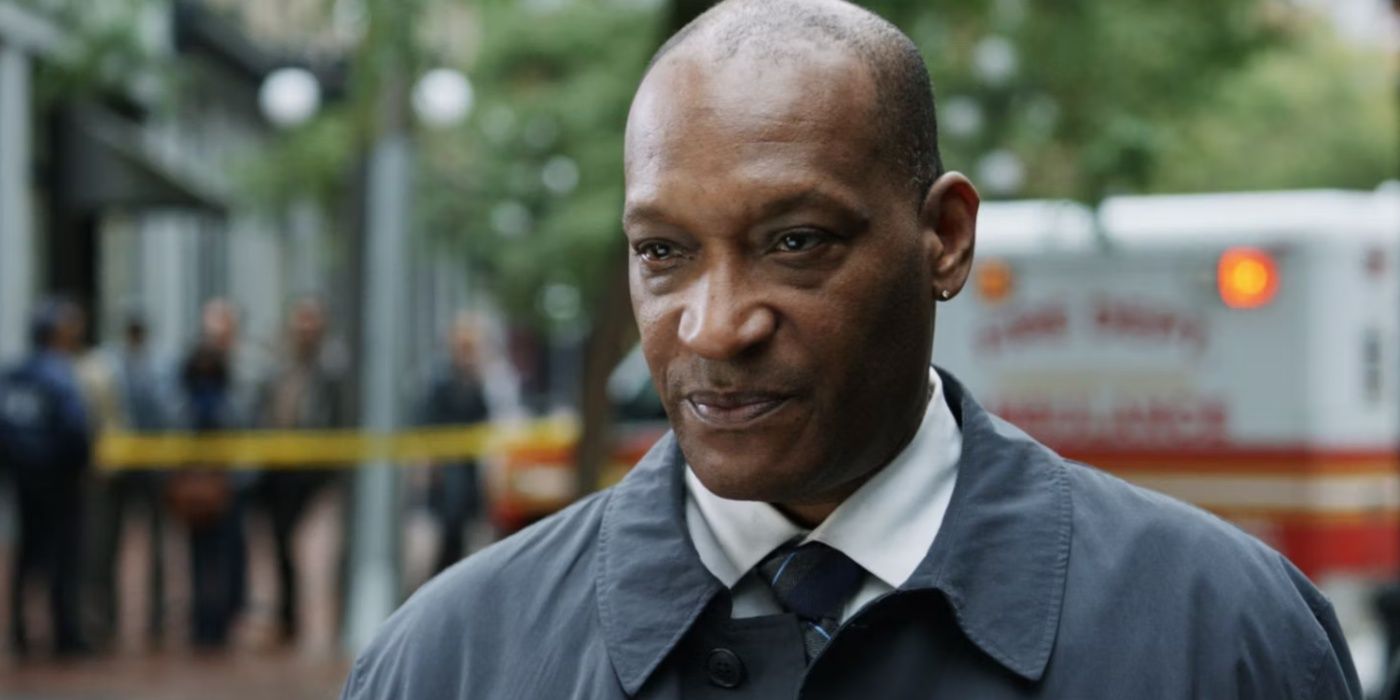 Tony Todd's William Bludworth standing outside a crime scene in Final Destination 5.