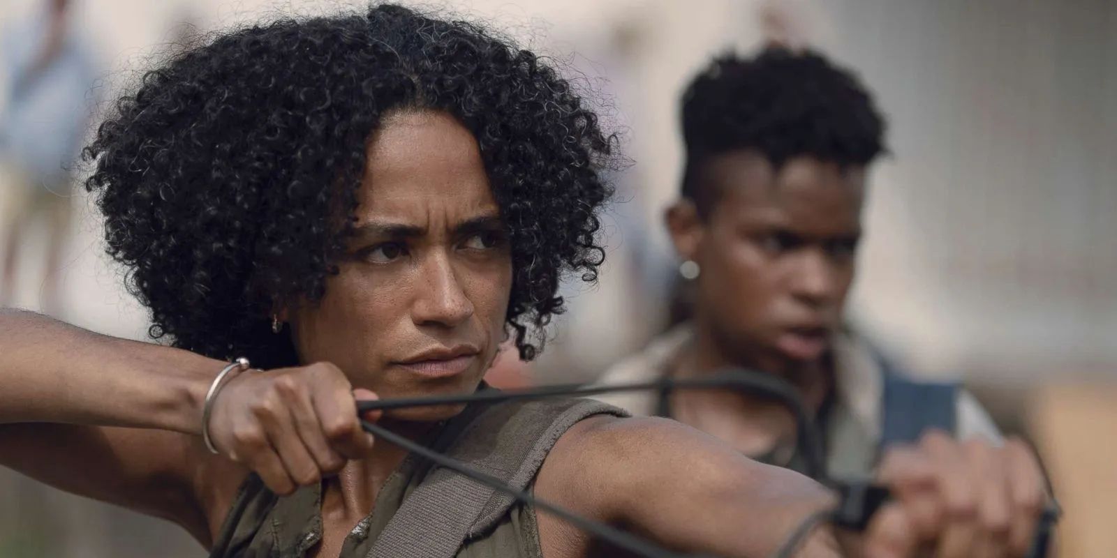 Connie (Lauren Ridloff) shooting a slingshot in The Walking dead