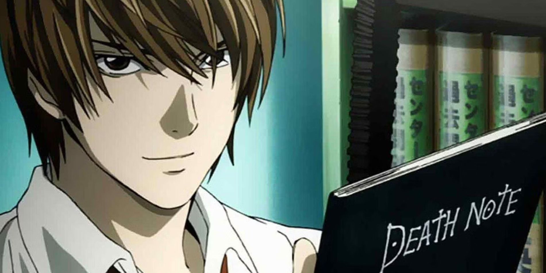 Light holds the Death Note menacingly in Death Note.