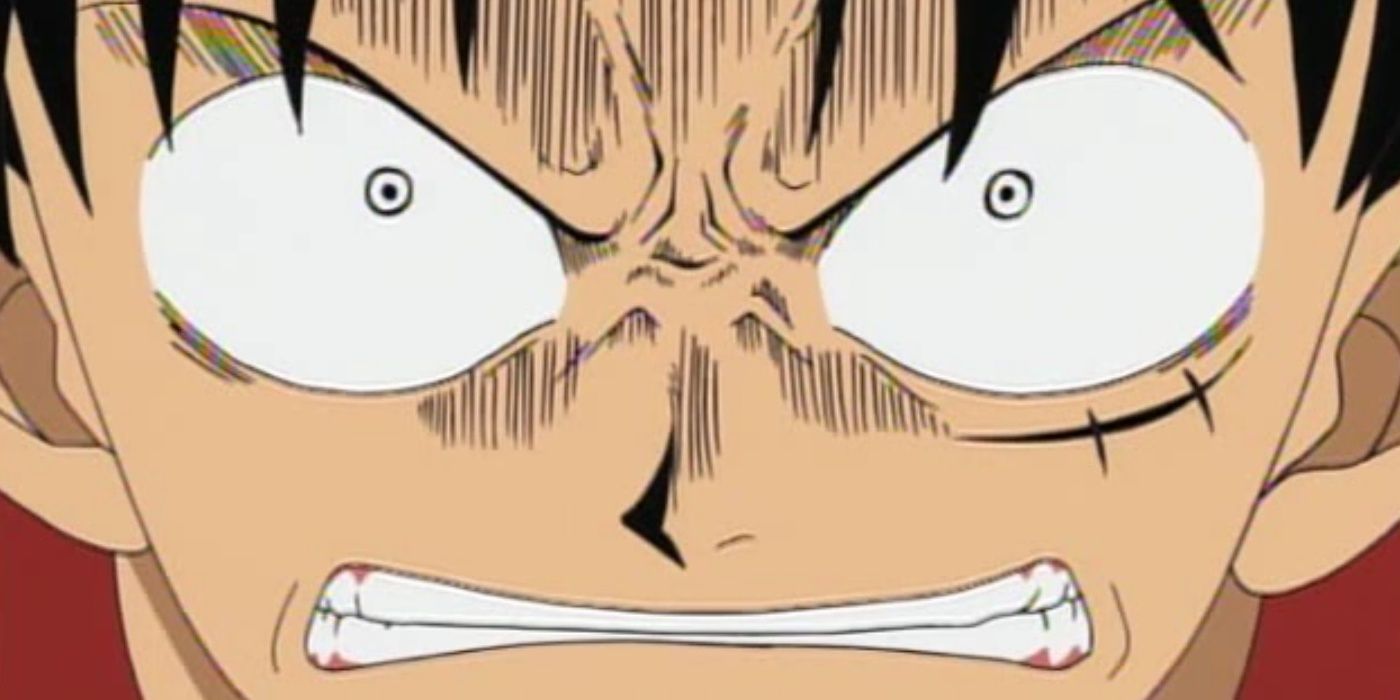 Luffy bares his teeth in rage in One Piece