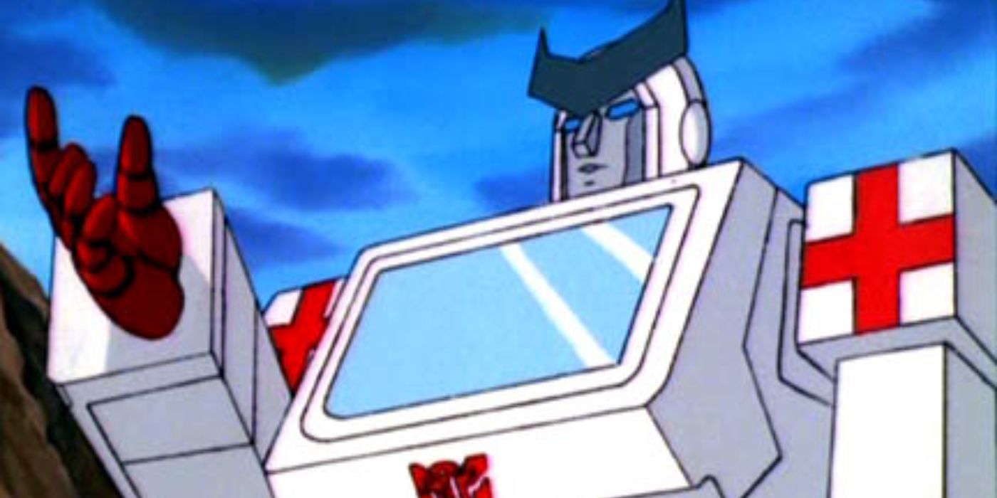 Ratchet estende a mão no desenho animado G1 Transformers.