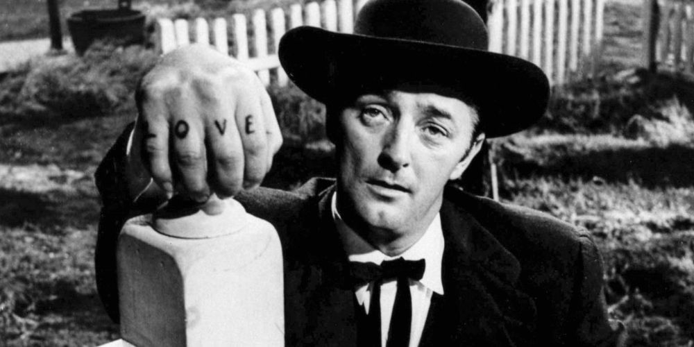 Robert Mitchum showing love tattoo in The Night of the Hunter