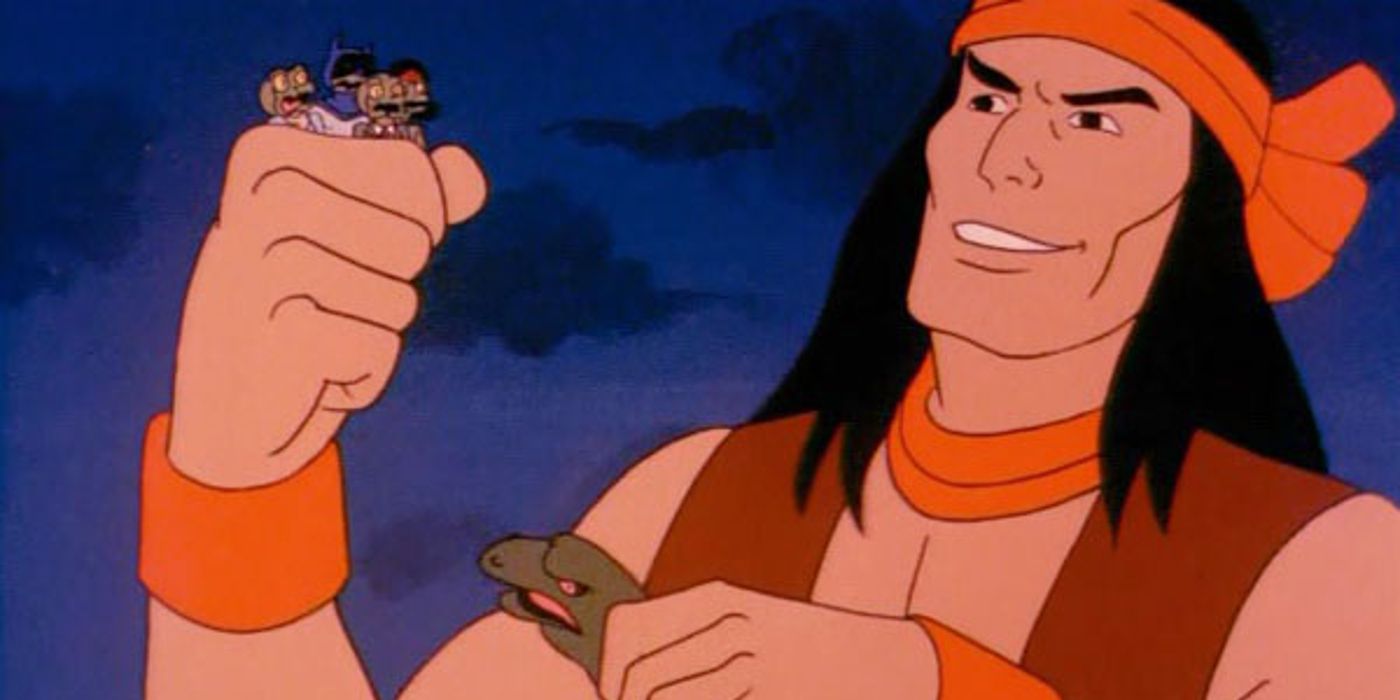 superfriends' apache chief holding a group of villains in one hand and a massive lizard in the other