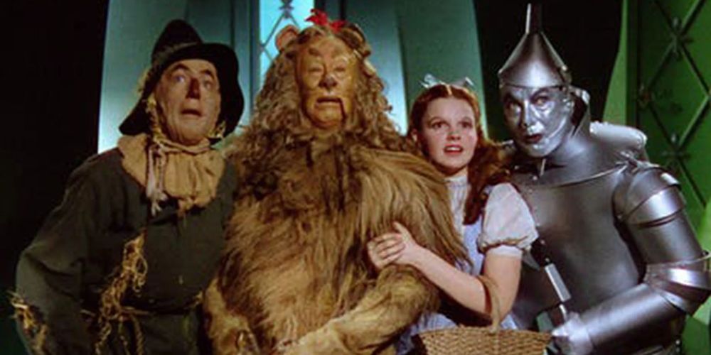 The central cast of The Wizard of Oz meeting Oz