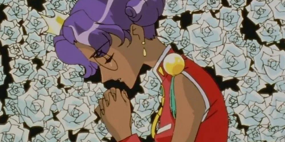 Anthy prays on a bed of roses in Revolutionary Girl Utena
