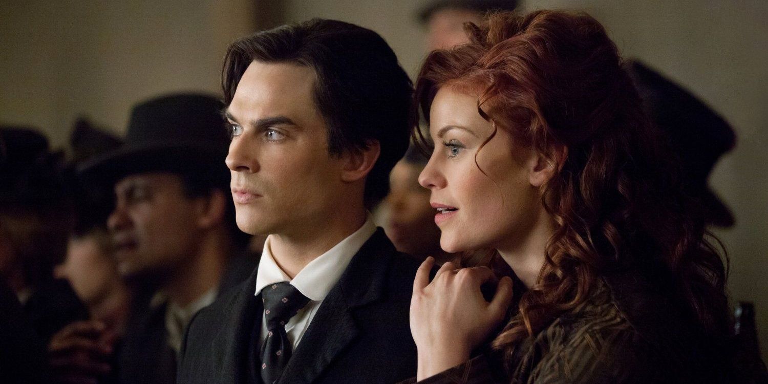 Damon and Sage in 1912 looking off screen in The Vampire Diaries.