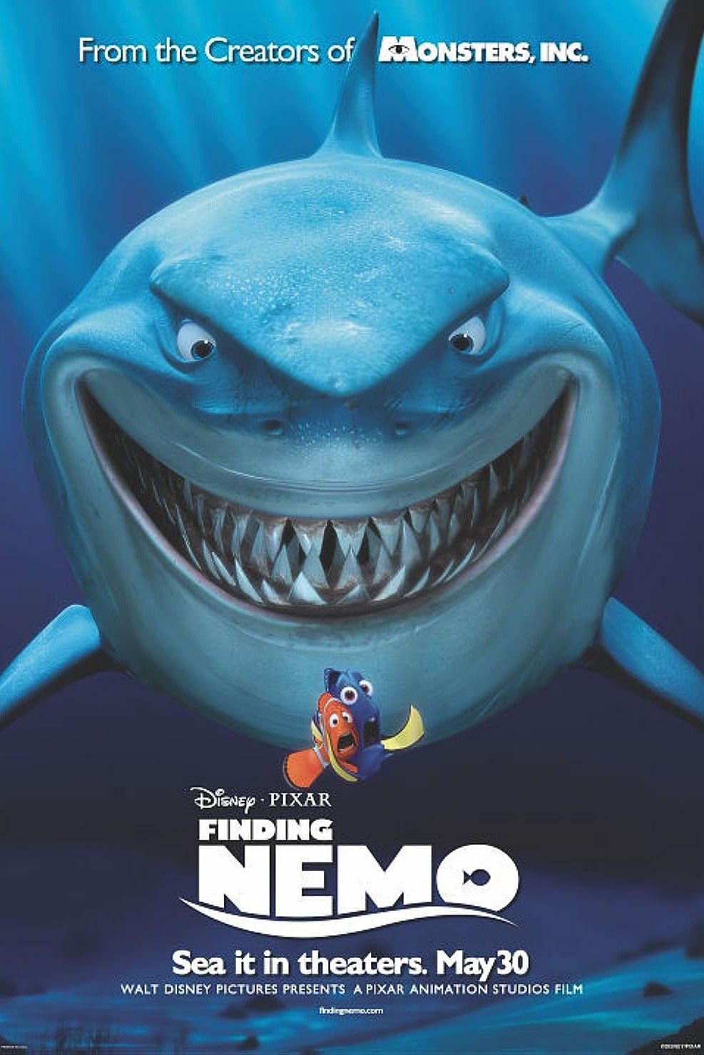 Bruce smiles hungrily at Marlin and Dory in Finding Nemo Poster