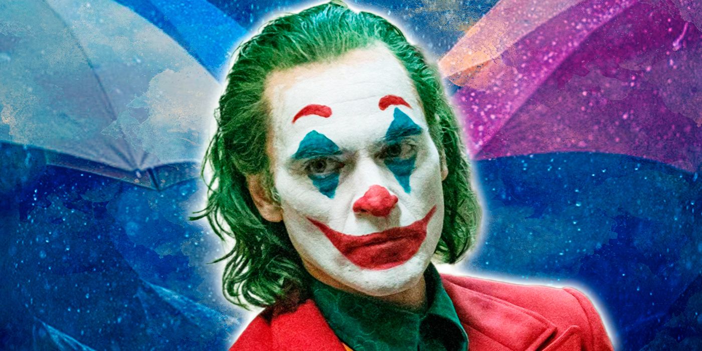 Joaquin Phoenix as Joker in front of umbrellas