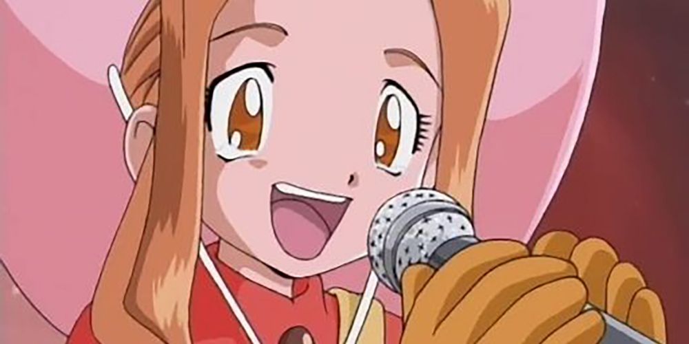mimi from digimon adventure smiling with mic