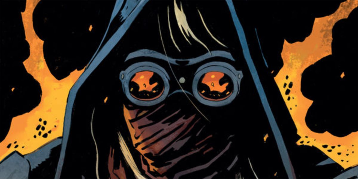 A cloaked figure wearing goggles and a mask in front of fiery tendrils on the cover of Mortal Terror #1