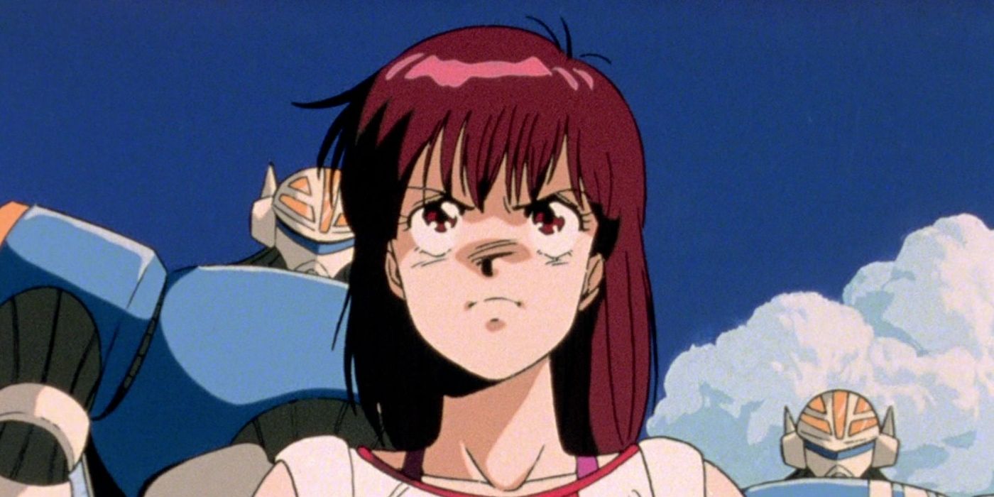 Noriko Takaya from the Gunbuster anime with a determined expression and mechas behind her.