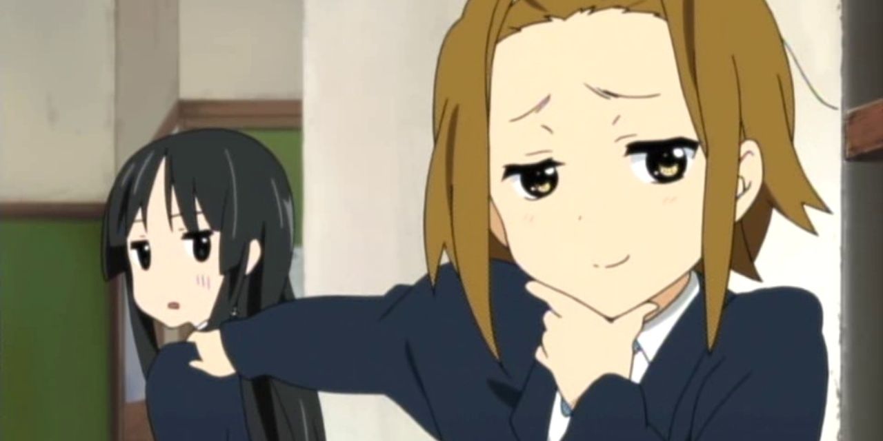 Ritsu Tainaka from K-On with a smug look on her face