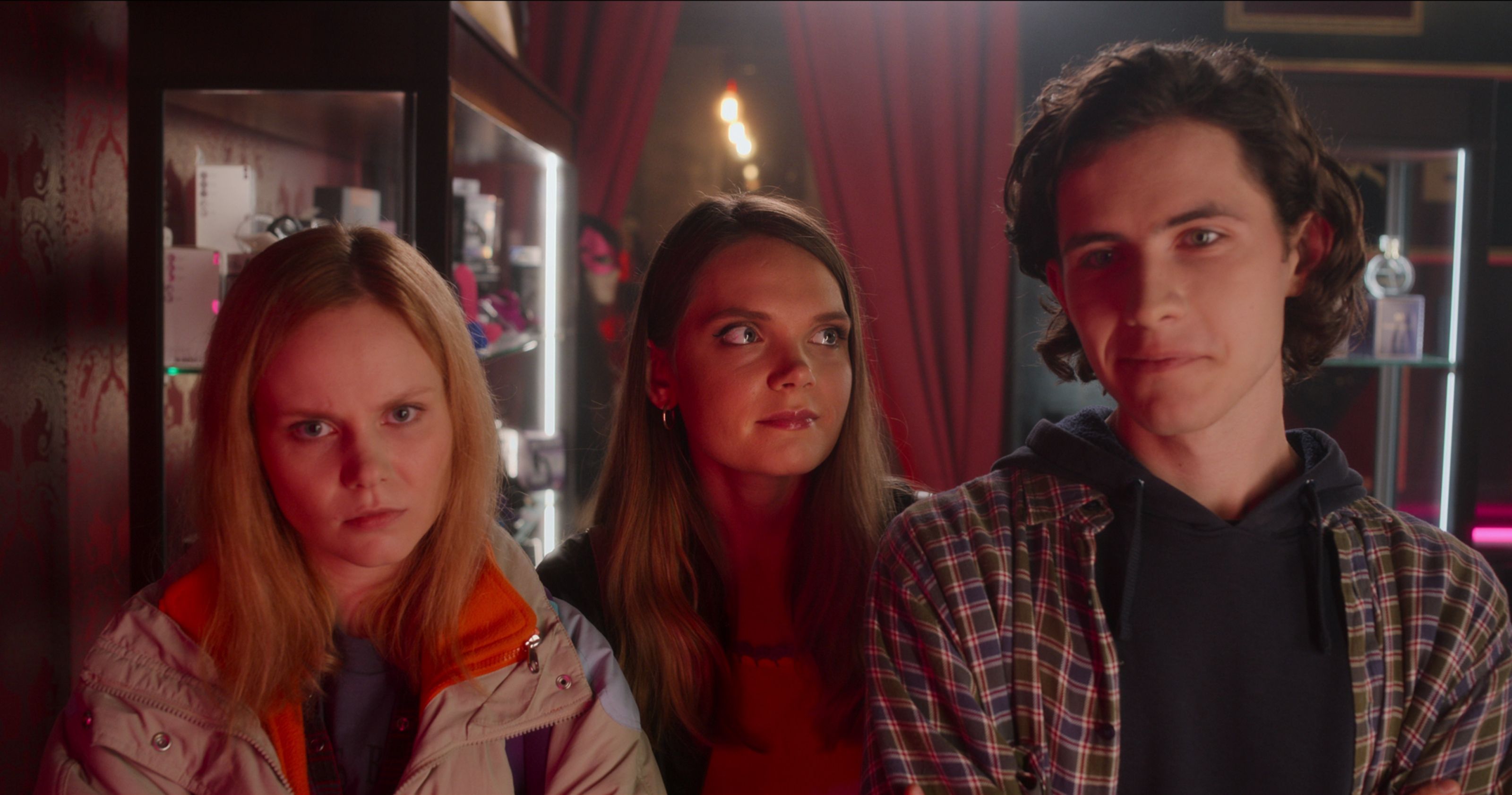 Natalia, Paulina and Adam stand together in Sexify.