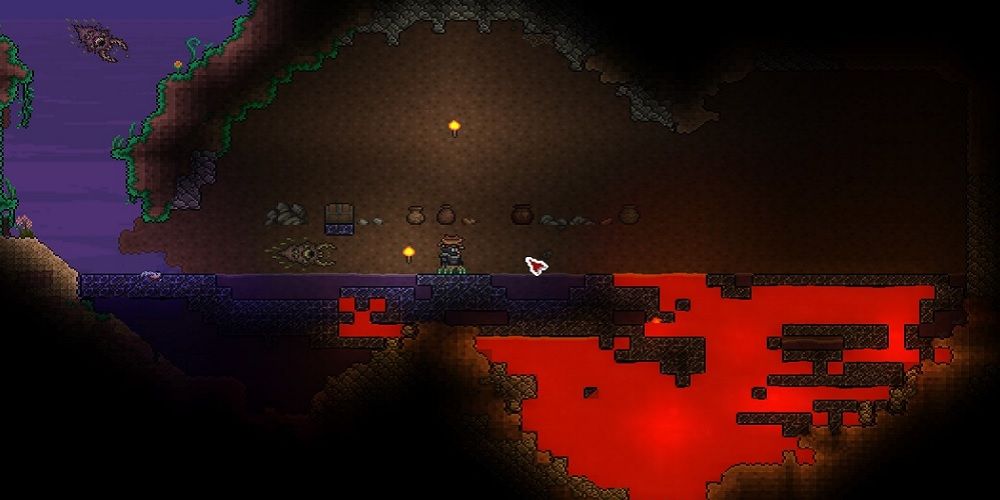 Para a semente The Worthy em Terraria com um jogador parado perto de uma piscina de lava