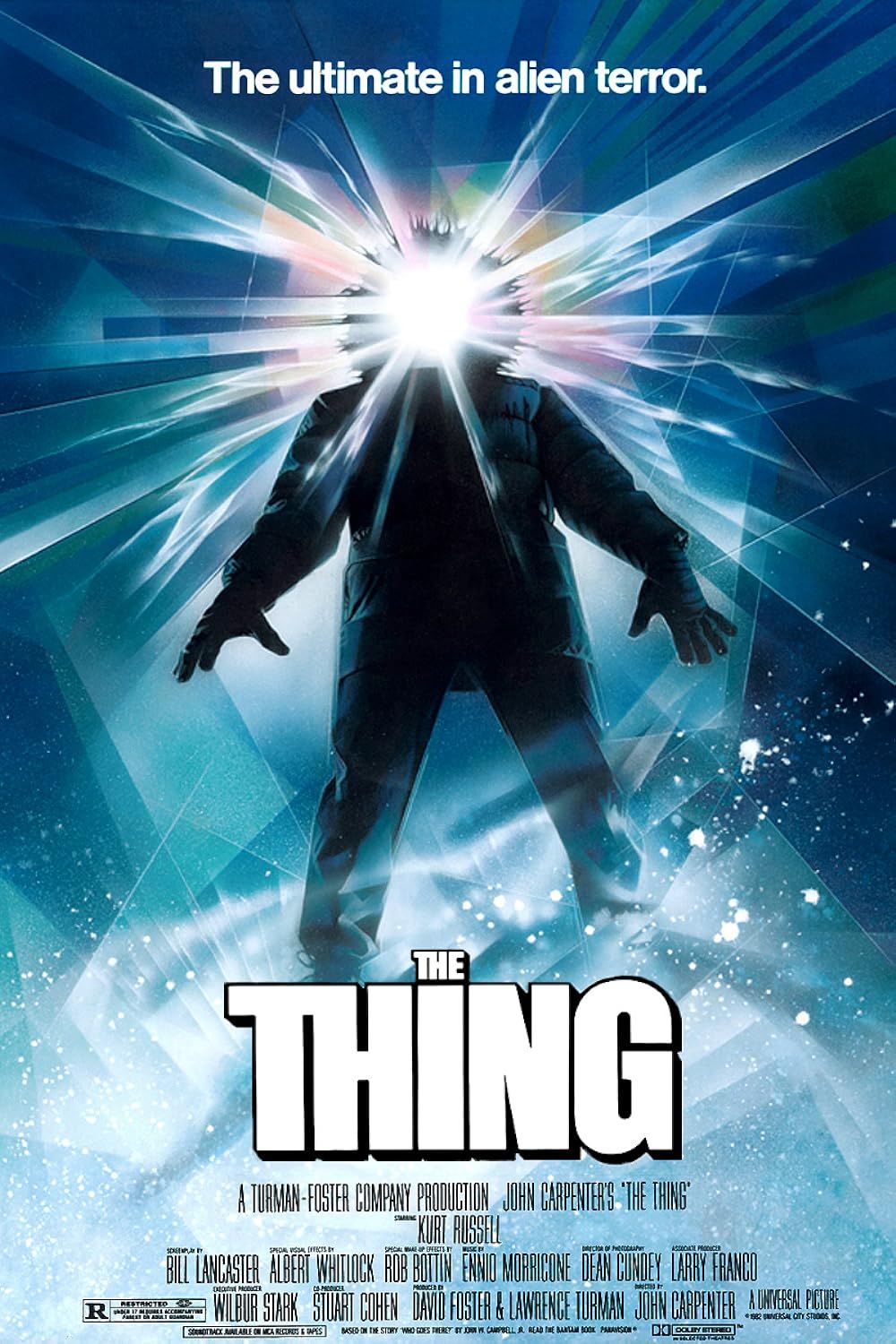 A Bundled Up Figure with Light Coming from Their Hood in The Thing 1982 Poster