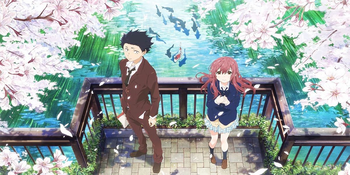 Shota Ishida and Shoko Nishimiya standing on a bridge surrounded by cherry blossoms in the anime movie A Silent Voice