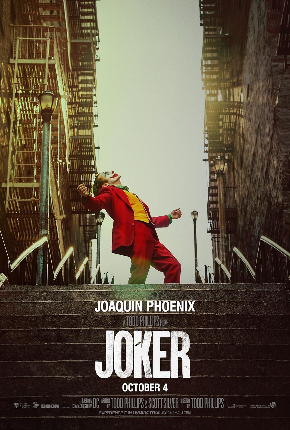 Joaquin Phoenix on the top of a staircase in Joker