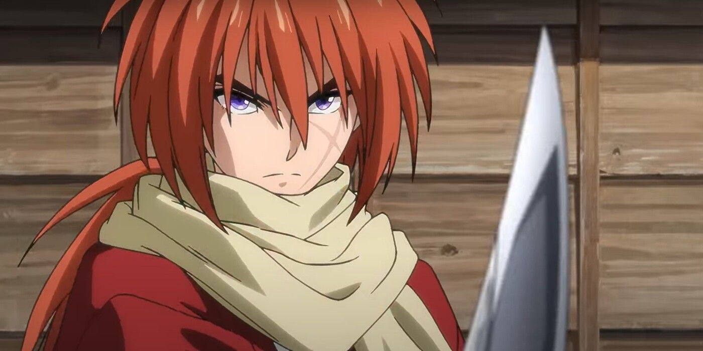 Himura Kenshin holds his sword with a determined expression in the Rurouni Kenshin reboot