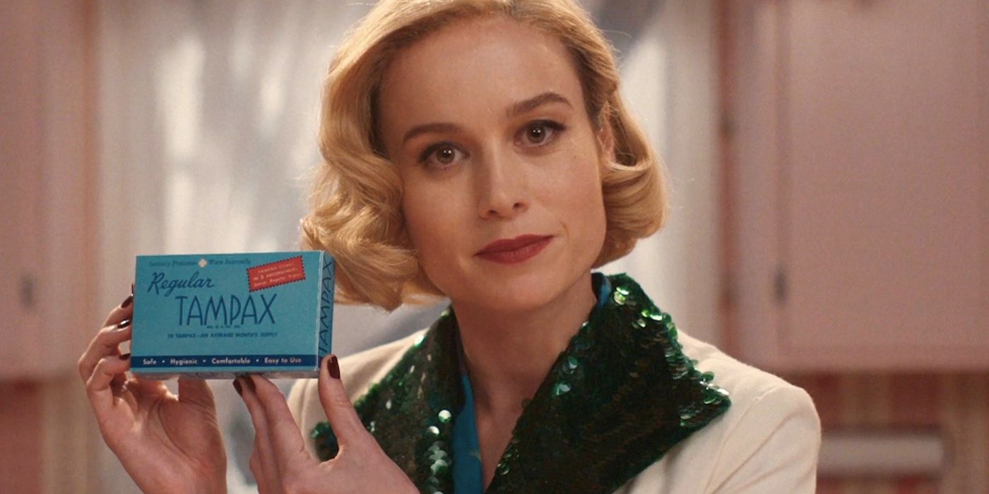 Elizabeth Zott holding a box of Tampax on Lessons in Chemistry