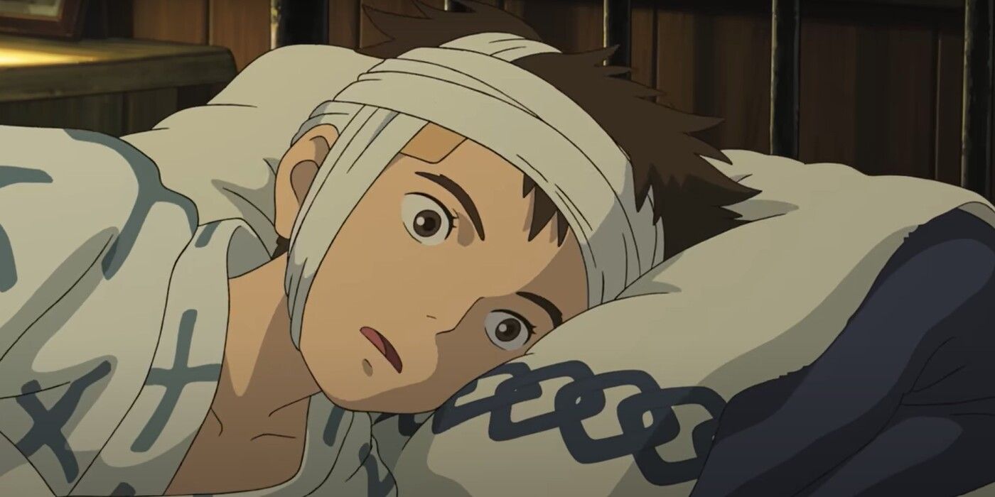 Mahito Maki lying in bed with his head bandaged up in Ghibli's The Boy and the Heron