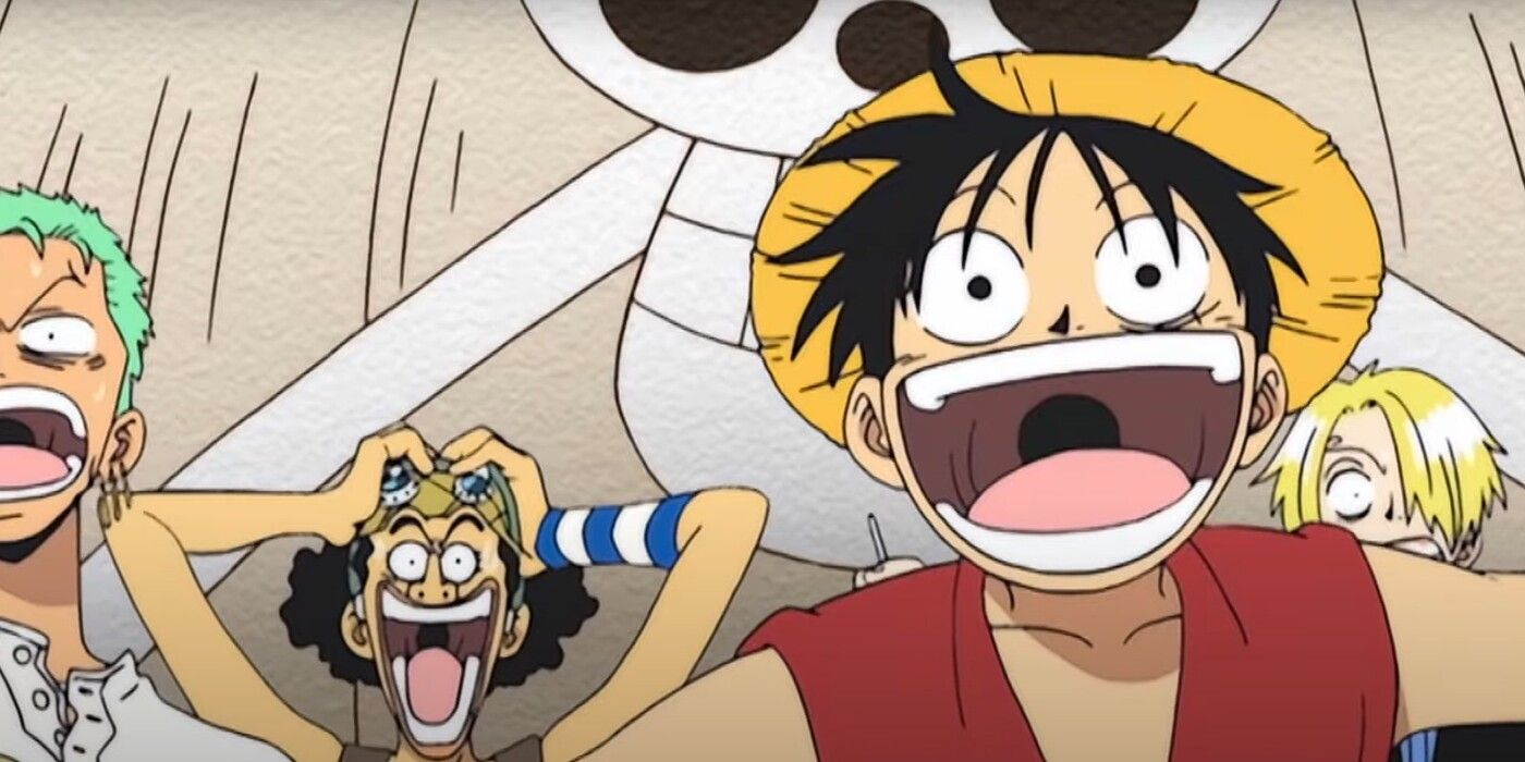One Piece's Luffy grins while Usopp, Sanji and Zoro look horrified behind him.
