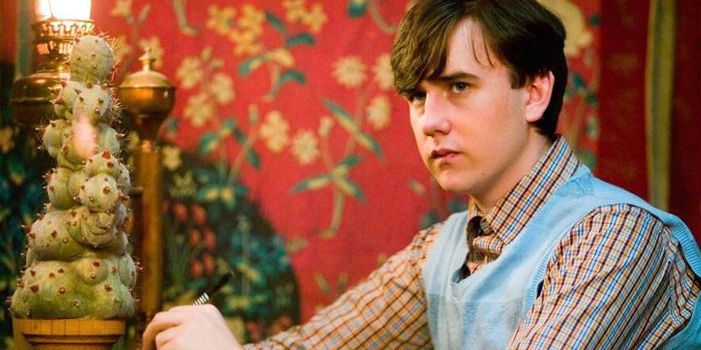 Neville Longbottom with a plant in Harry Potter and the Order of the Phoenix