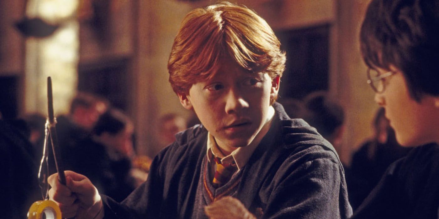 Ron Weasley using Spell-O tape on his broken wand