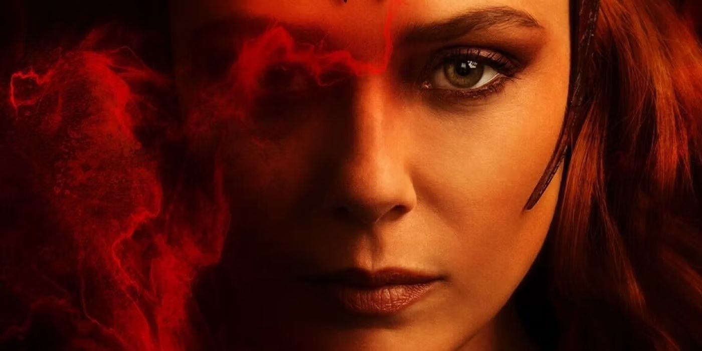 Elizabeth Olsen as Scarlet Witch in Doctor Strange and the Multiverse of Madness Stares Straight Ahead as Red Magical Smoke Covers Half of Her Face