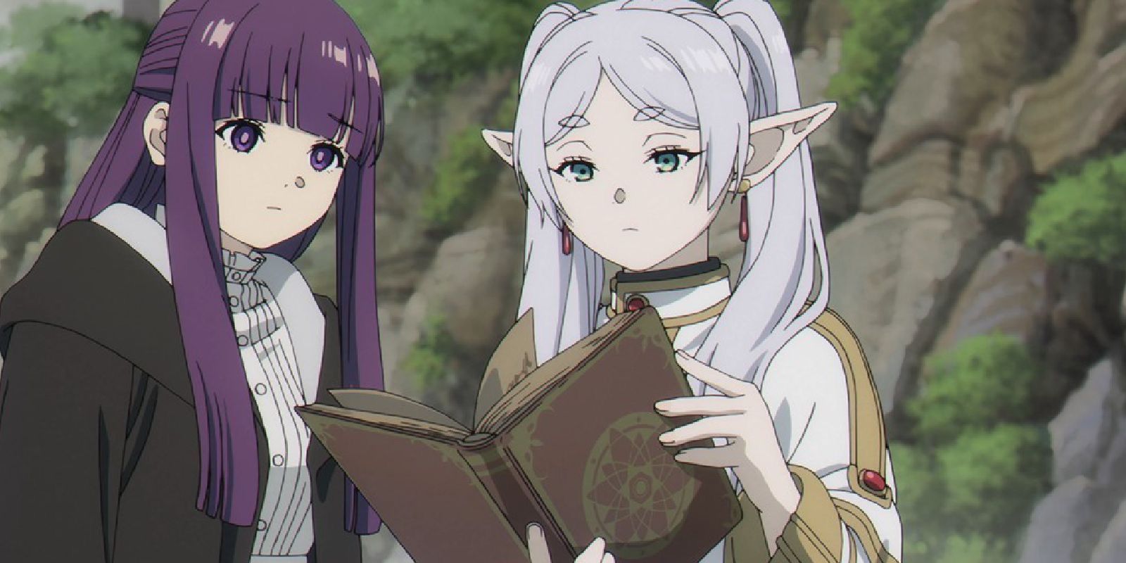 Frieren reads a grimoire with Fern in Frieren Beyond Journey’s End anime