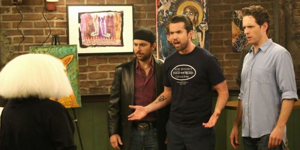 Frank, Charlie, Mac, and Dennis at an art gallery in It's Always Sunny