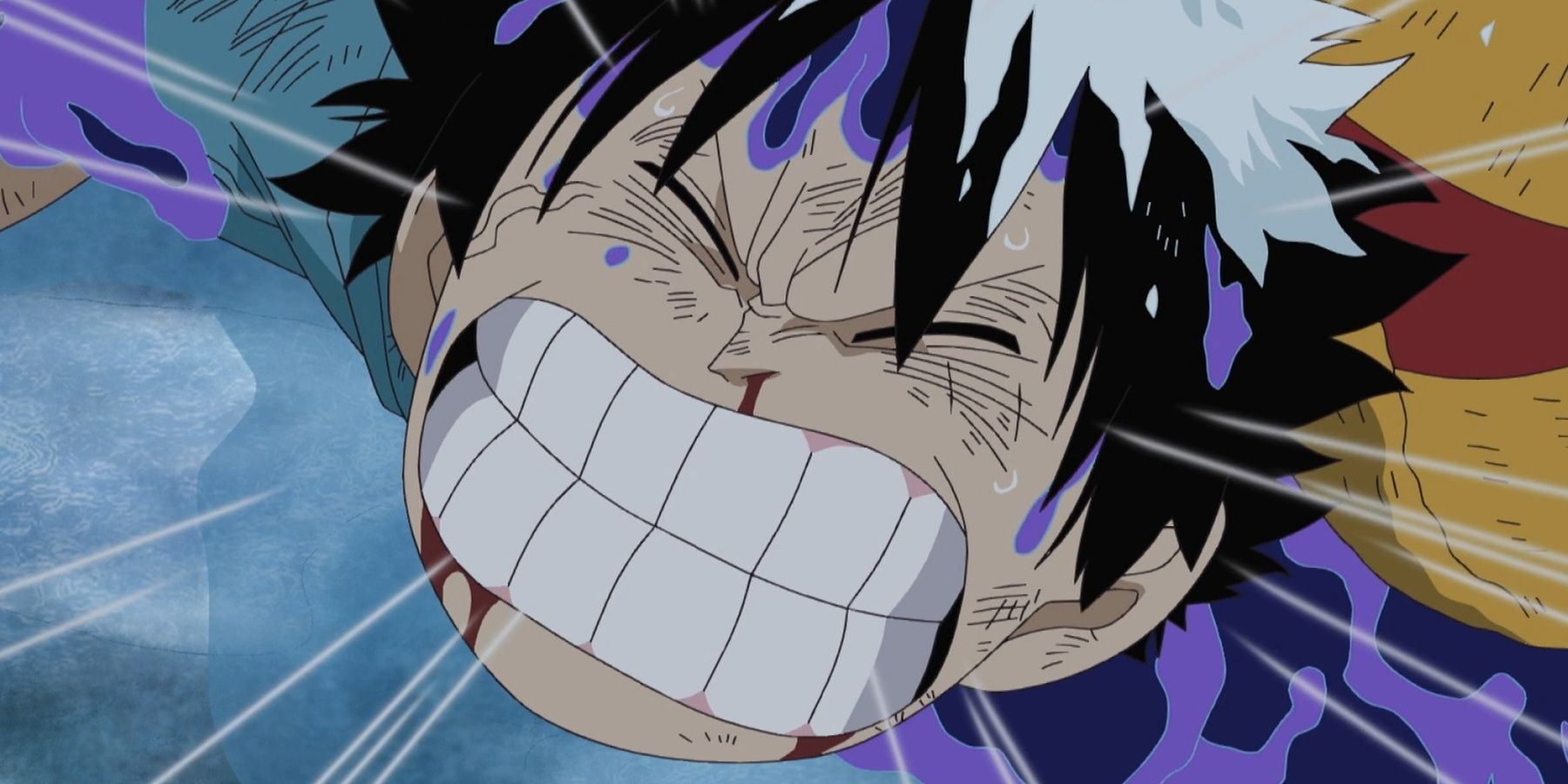 Luffy is baring his teeth in Impel Down in One Piece.