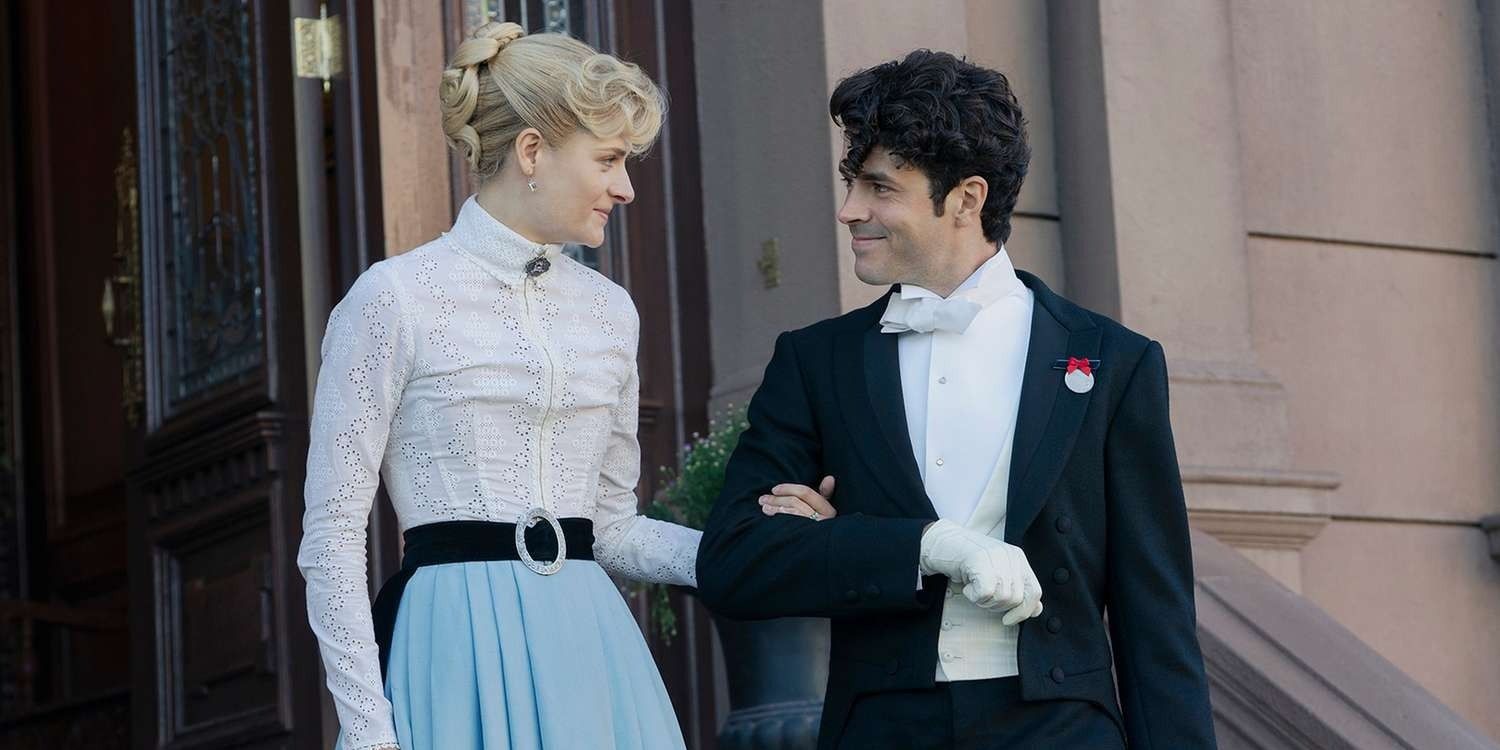 Marian Brook takes Larry Russell's arm in The Gilded Age Season 2.