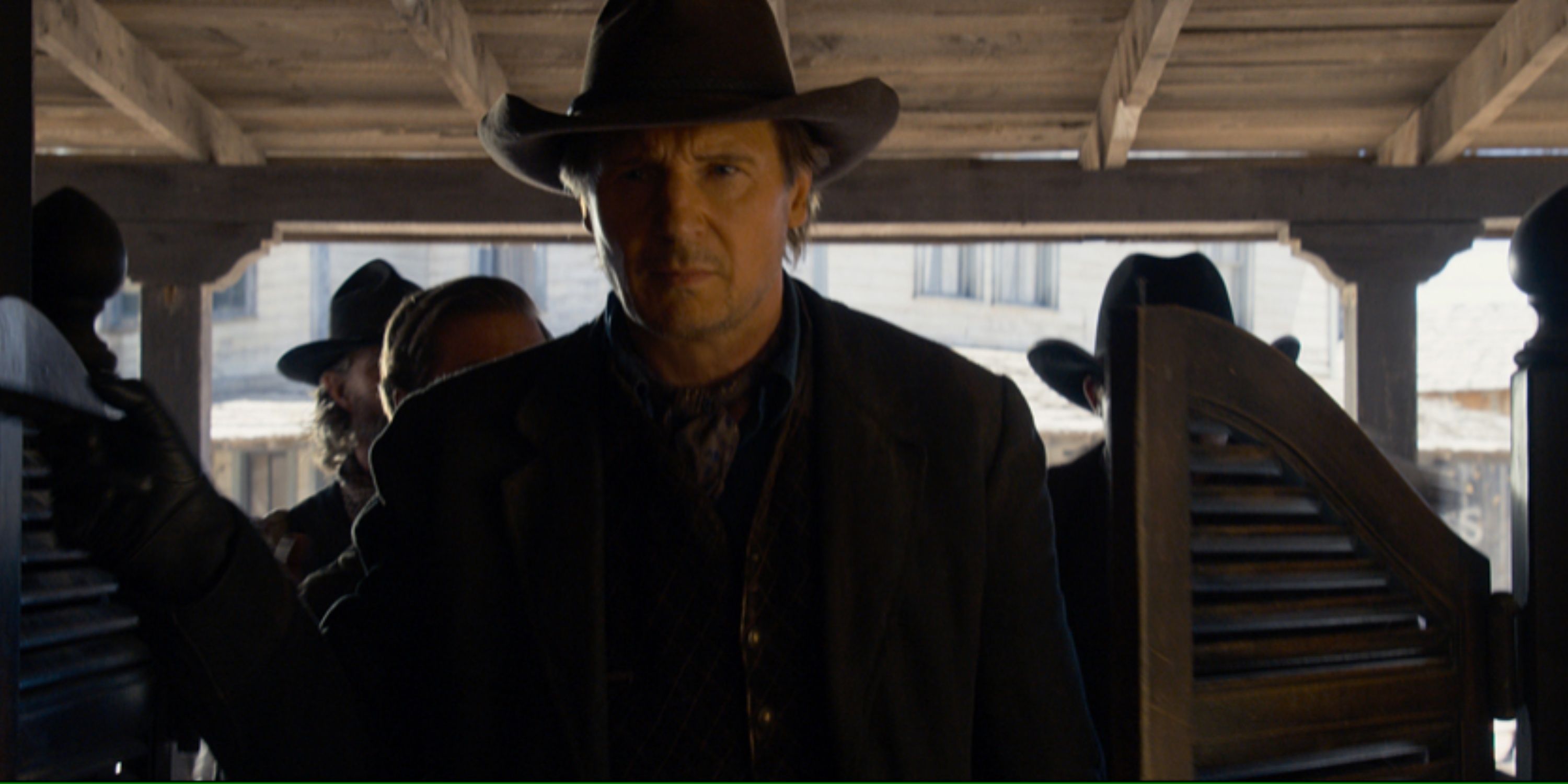 Clinch (Liam Neeson) walks into a saloon in A Million Ways to Die in the West