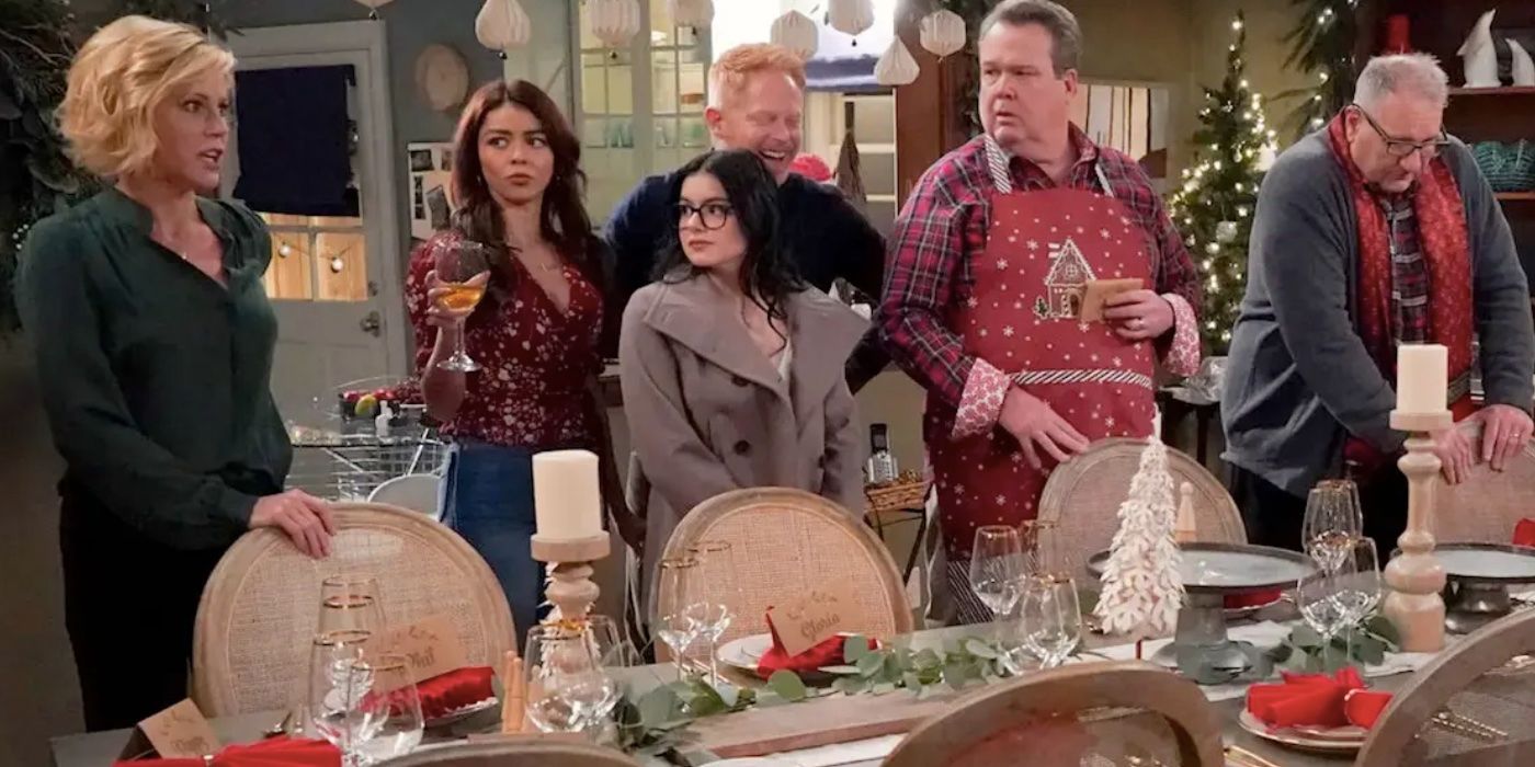 Claire, Haley, Alex, Mitch, Cam and Jay at the dinner table on Christmas in Modern Family