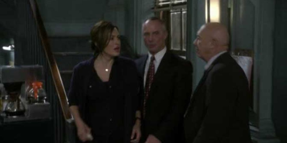 Mariska Hargitay as Olivia Benson stands with Robert John Burke as Ed Tucker and Dann Florek as Don Cragen in SVU's Perverted