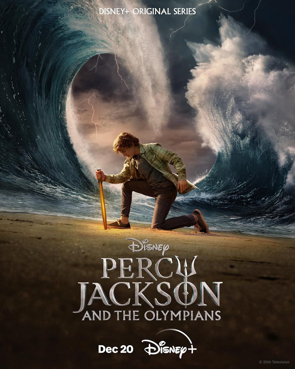 Percy Jackson Holds a Sword with Waves Crashing Behind Him on the Percy Jackson and the Olympians Promo