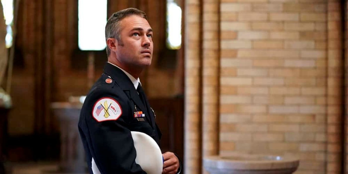 Taylor Kinney stands in dress blues as Kelly Severide on Chicago Fire