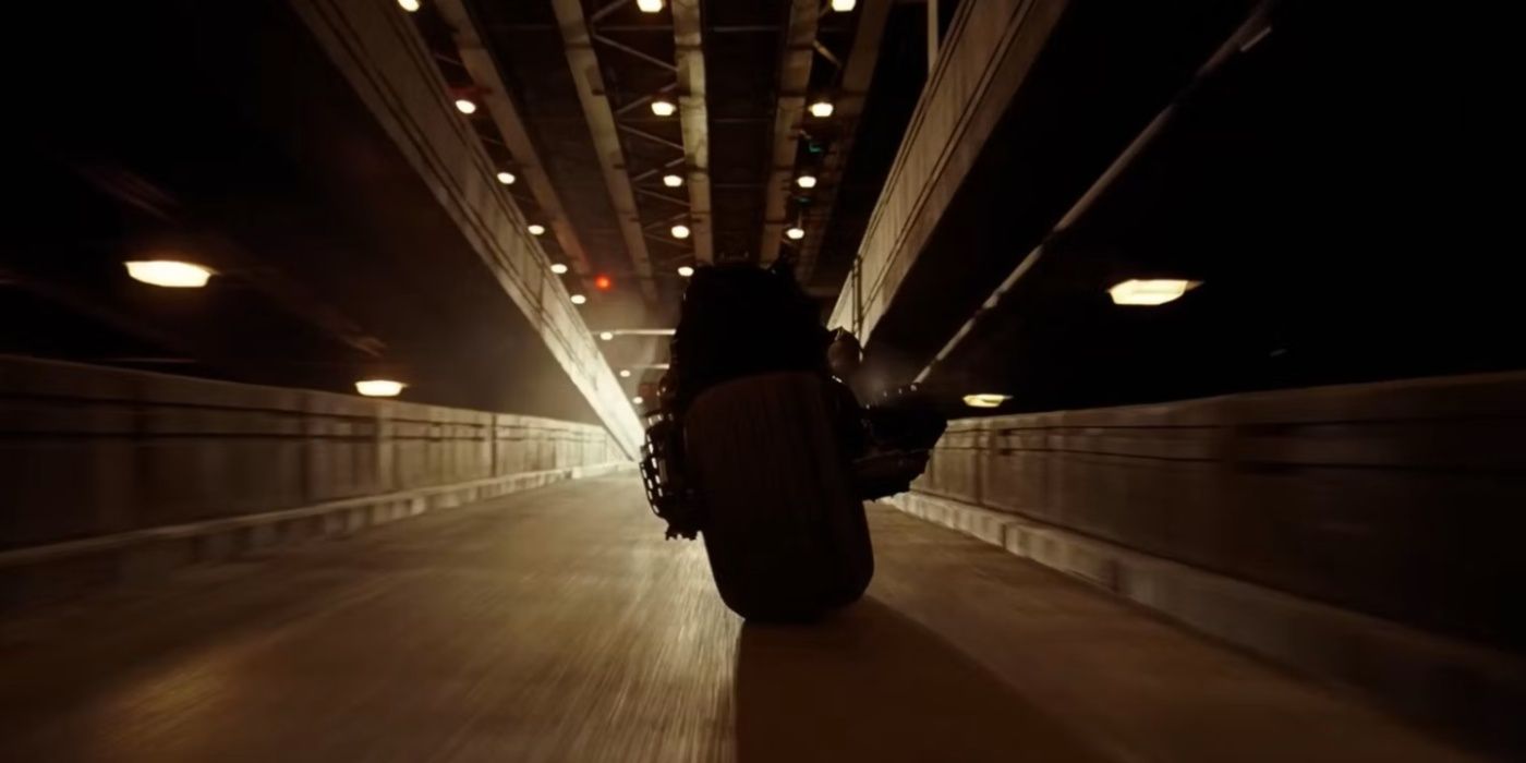 Batman riding off on his motorcycle in The Dark Knight's ending.