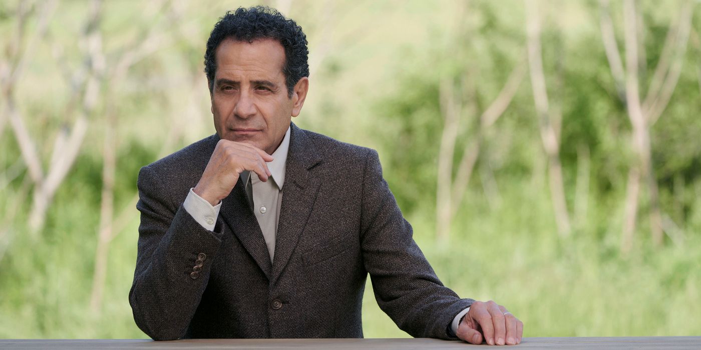 Adrian Monk (played by actor Tony Shalhoub) sits at a park bench in Mr. Monk's Last Case