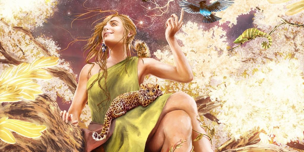 Yavanna sits in a tree on a golden day, wearing a green dress with a baby leopard on her lap.