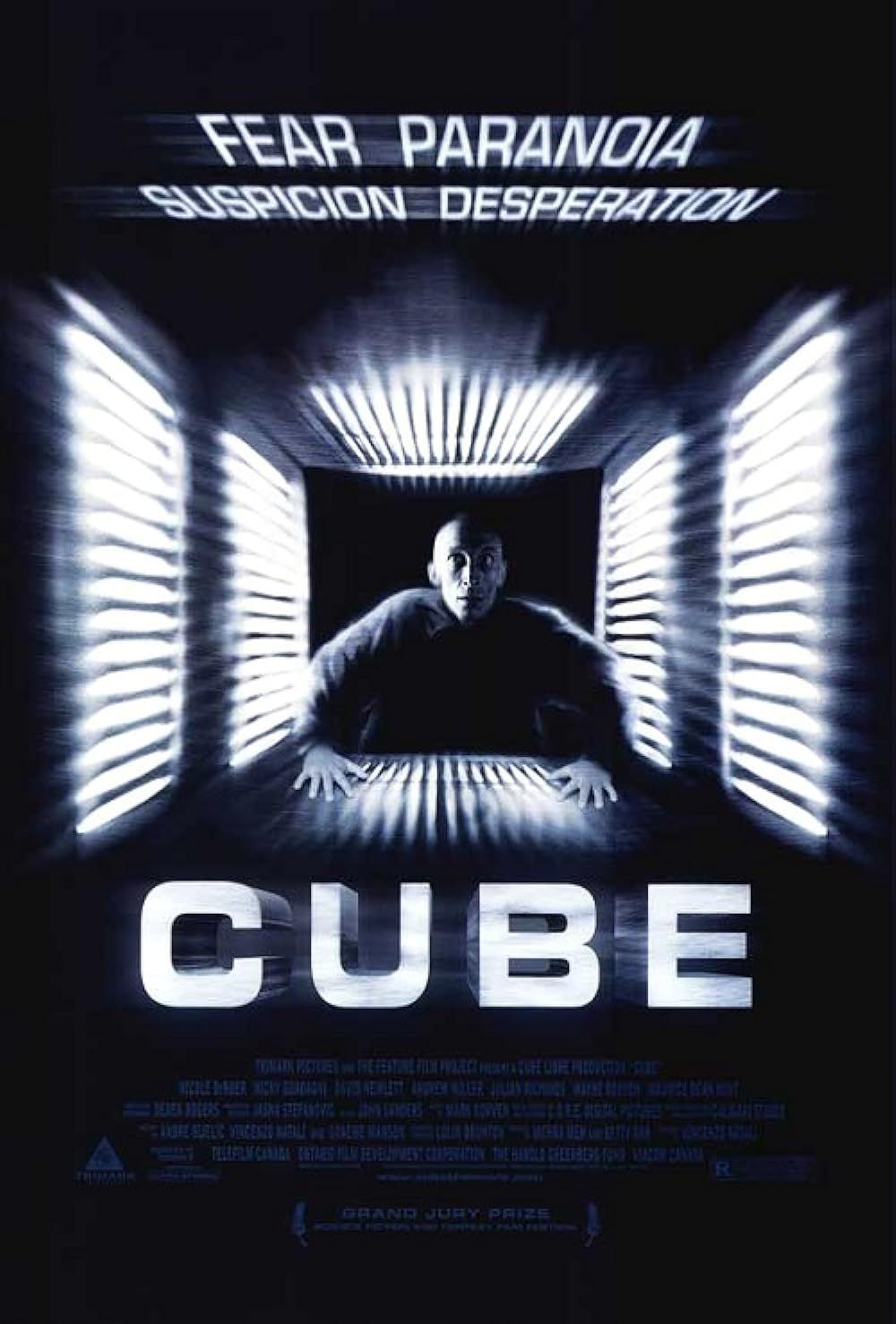 A man trying to escape on the Cube 1997 poster